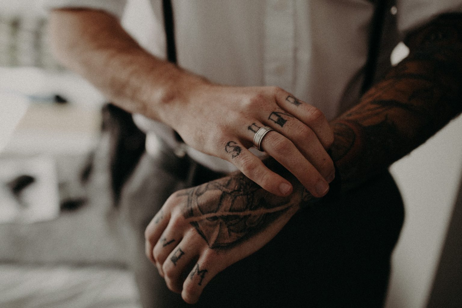 tattooed groom rings