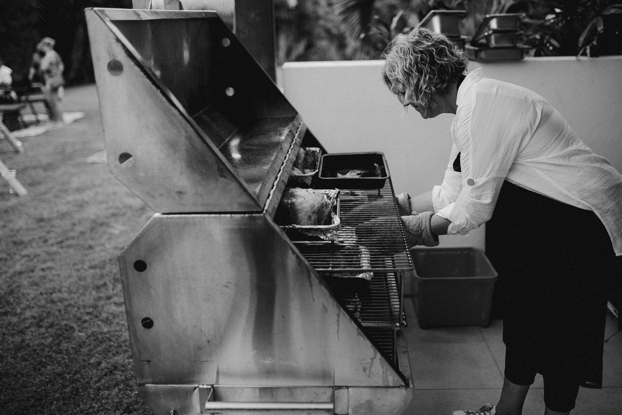 caterer roasting meat at garden wedding Eatons hill Brisbane