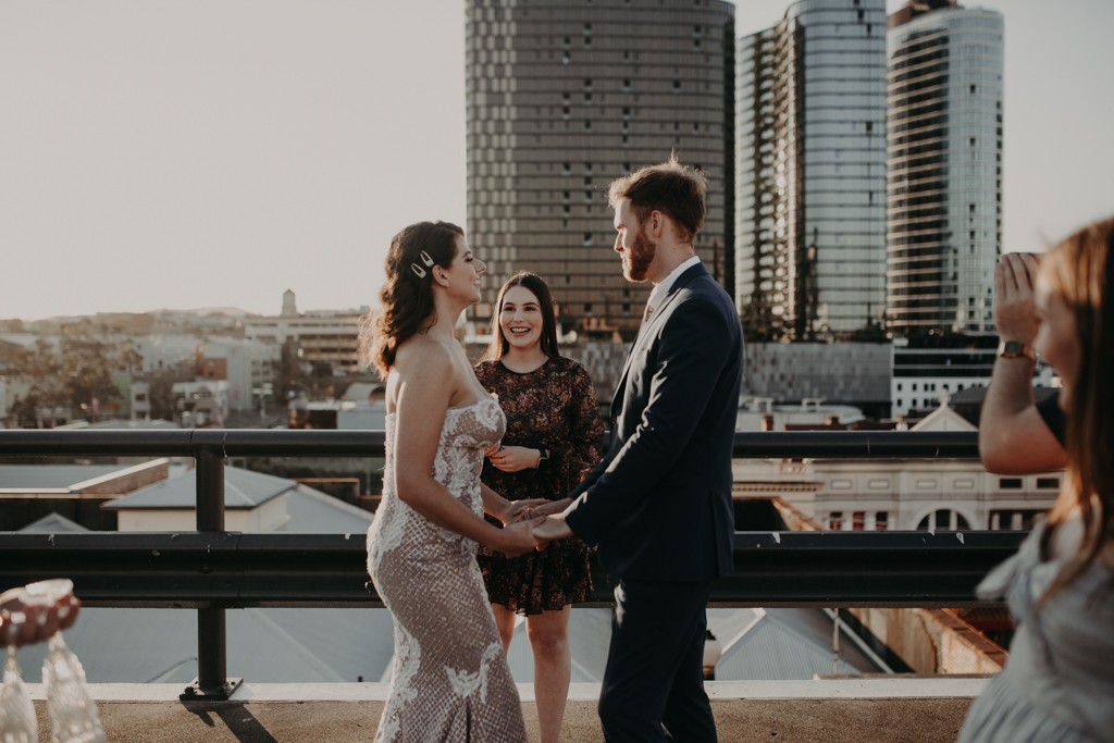 bride and groom on  rooftop for New York style elopement in Fortitude Valley Brisbane
