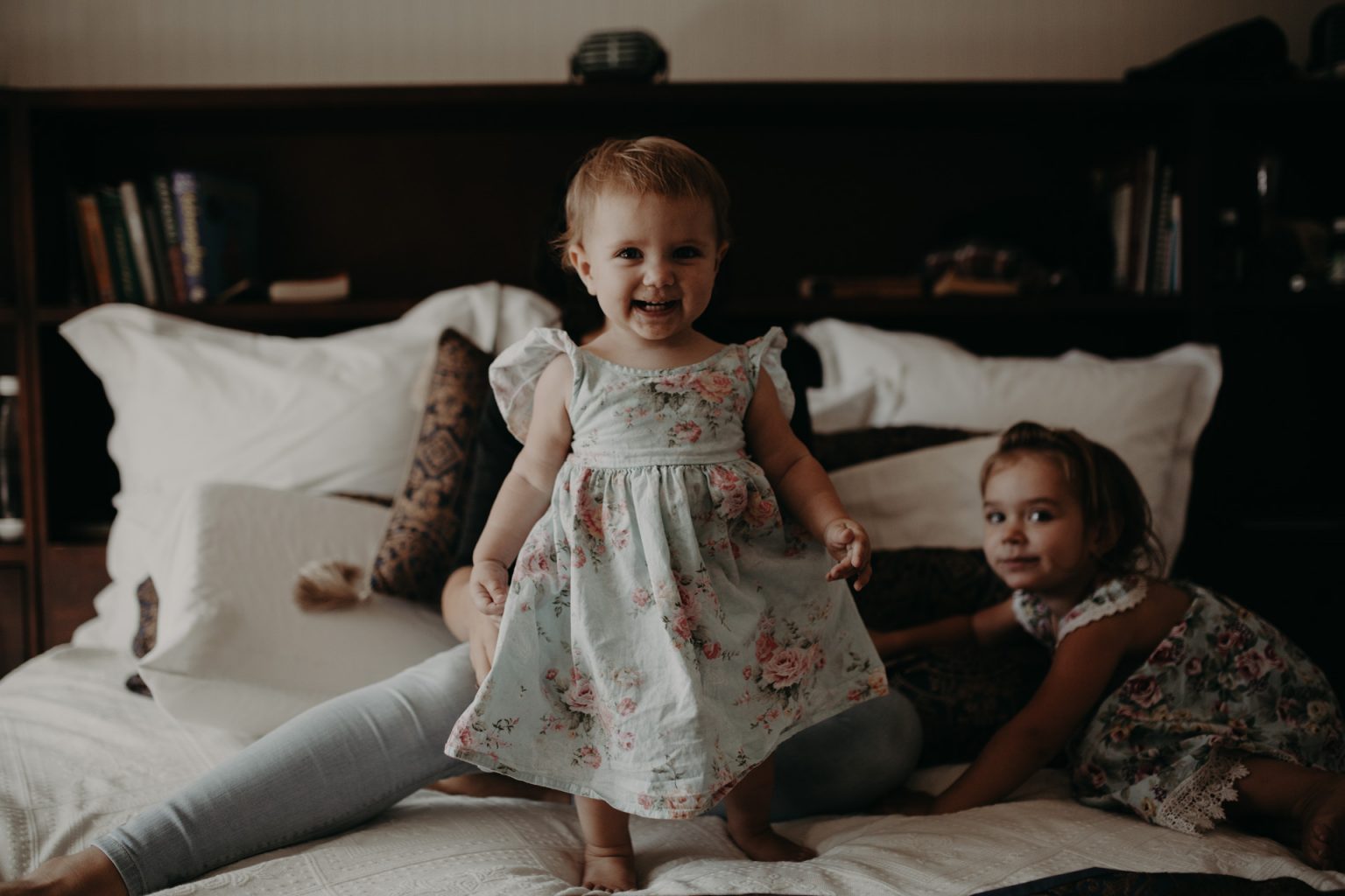 Brisbane mother and toddlers on bed